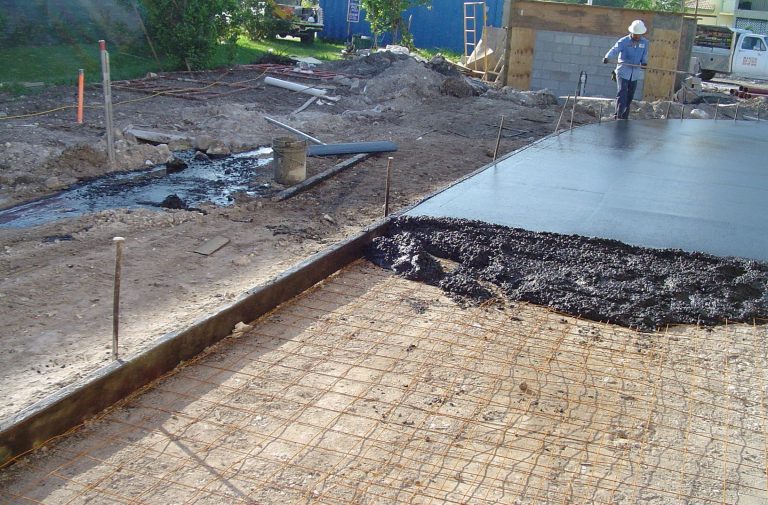 Man working on asphalt pavement
